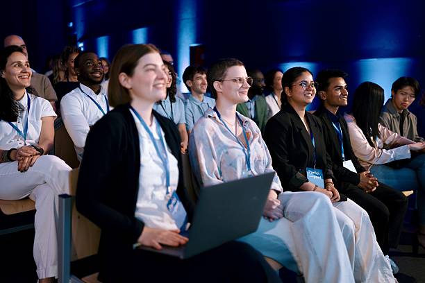 istock Diverse Professionals Attend Presentation at a Modern Business Conference 2224111106