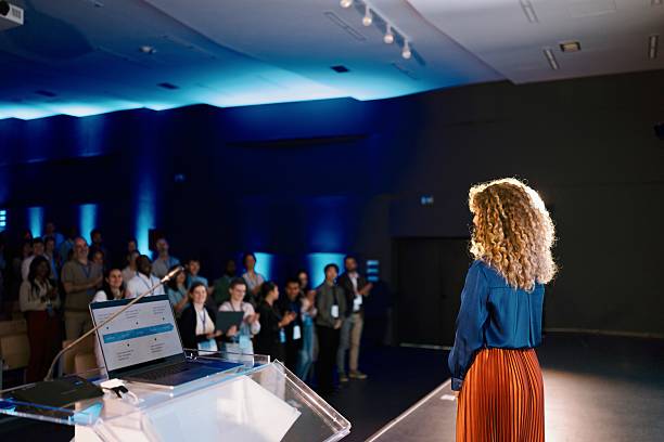 istock Audience Applauding Guest Speaker at Business Conference 2224111115