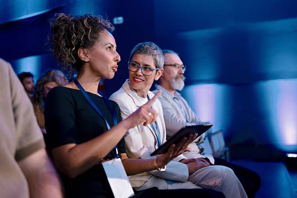 Professional Audience Engaged During a Business Conference in a Modern Venue