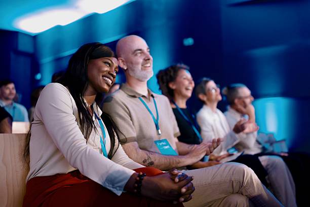 istock Diverse Professionals Engaged in a Business Conference in a Modern Venue 2224111275