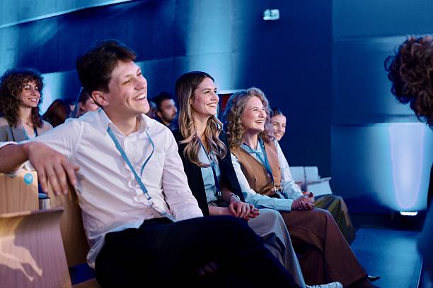 istock Diverse Professionals Engaged in Business Presentation at Modern Conference Venue 2224111301