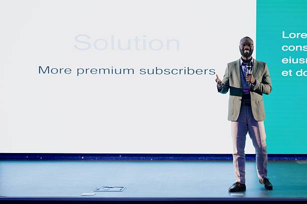 istock Confident Speaker Presenting AI Innovation Ideas at a Professional Conference 2224111439