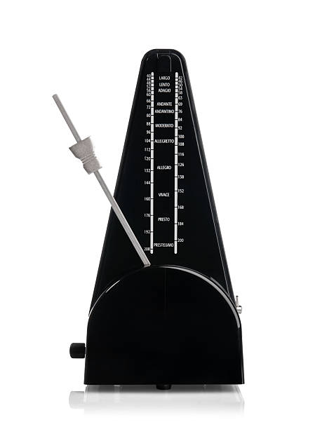 istock Classic mechanical metronome with tempo markings, isolated on white background, path included. Black plastic body with silver pendulum. Ideal for music education, practice, and timing precision. 2224111720