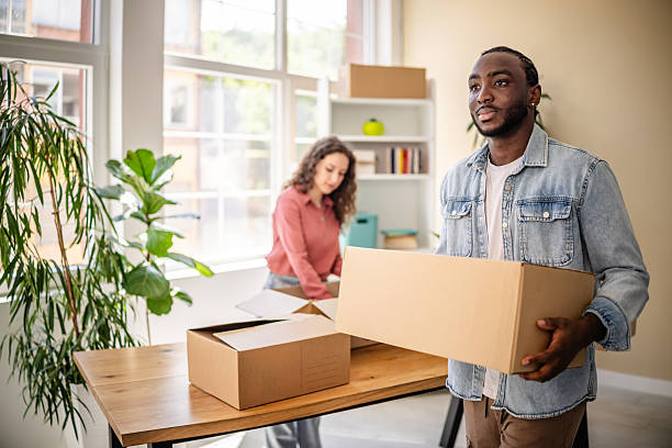 istock Calm man unpacking in a new apartment 2224113275
