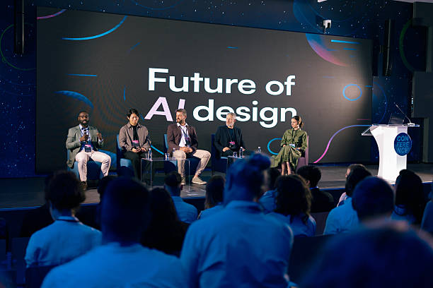 istock Male AI Experts Discussing Trends Led by Female Moderator at Corporate Panel 2224113814