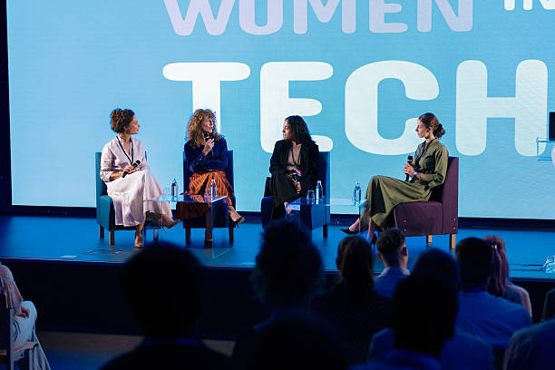 istock Female Professional Speaking at Modern Corporate Panel Discussion on Technology and Innovation 2224113875