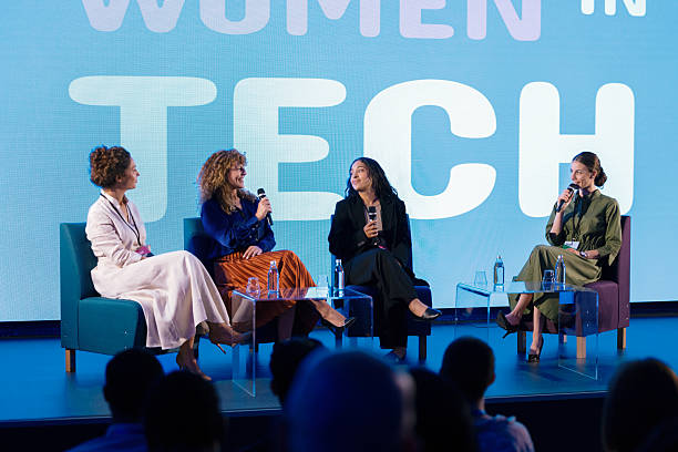 istock Women Leaders Discuss Diversity and Innovation in Modern Technology at Corporate Event 2224114027
