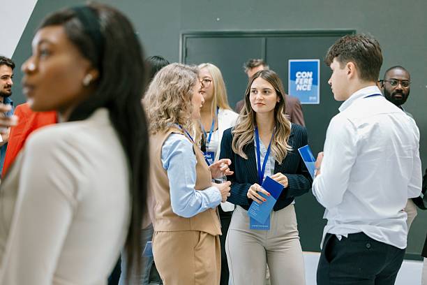 istock Diverse business professionals networking during conference break 2224118839