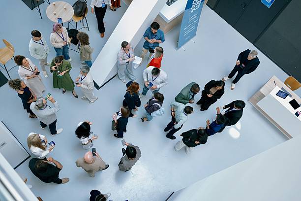 istock Top view of large group networking at business event 2224118960