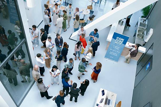 Overhead crowd shot – professionals connecting at event