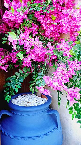 istock decorative navy blue large clay pot and artificial flower 2224124466