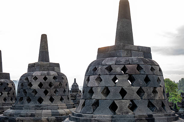 Stone Carved Stupa Borobudur Structure with Diamond Pattern and Towering Spire