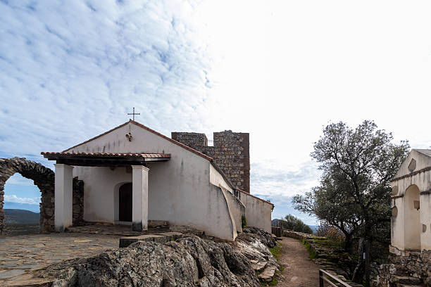 istock Longobard church and tower showing cloudy sky 2224131252