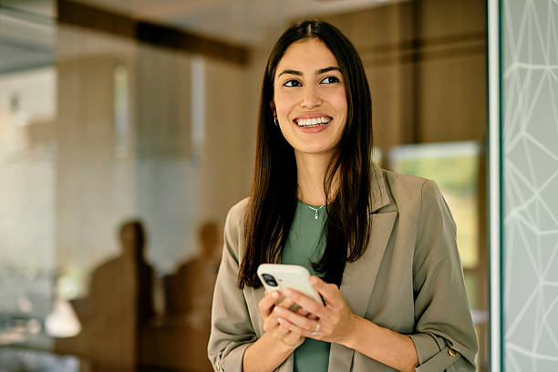istock Young Professional Woman Smiling in Modern Office 2224132583