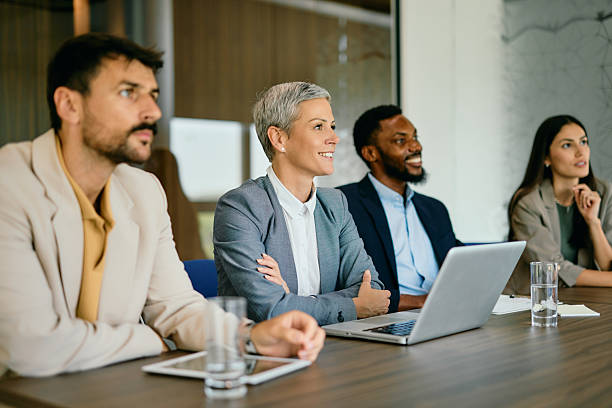 istock Diverse Group of Professionals in a Meeting 2224132618