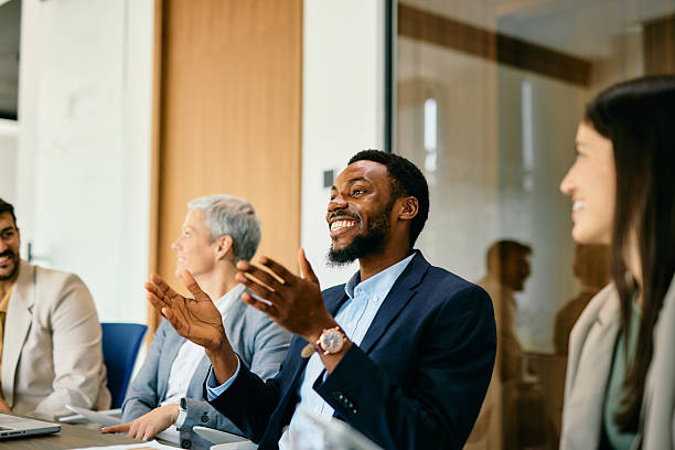 istock Enthusiastic businessman gesturing while talking in a meeting 2224132656