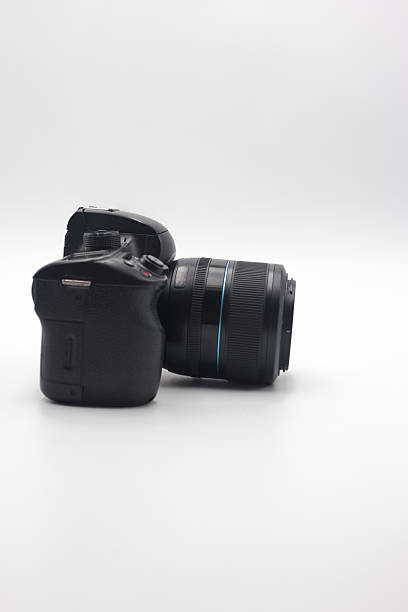 istock Compact digital camera with lens positioned on a white background showcasing design details and features for photography enthusiasts 2224132943