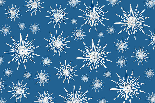 Abstract blue Christmas background made of knitted white snowflakes. Mockup for your text and sentences. Flat lay, copy space