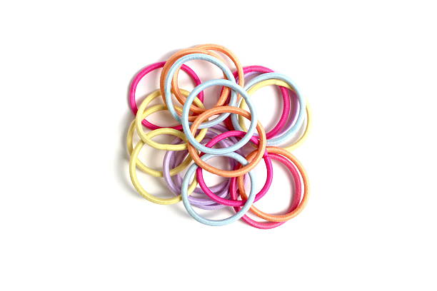 istock There are many hair ties lying on a white background. 2224139274