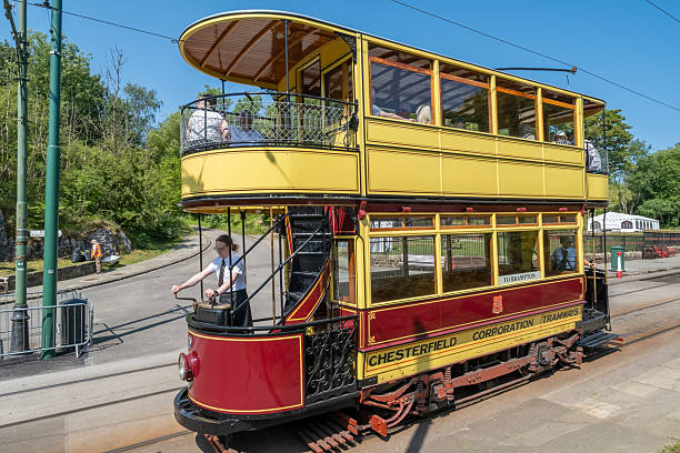 Crich, Derbyshire, UK  June 19 2025.Side on view of a vintage tram on a sunny day