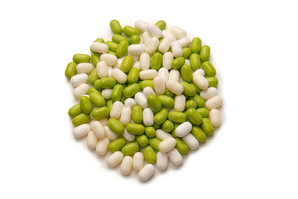 Sweet multicolored candies isolated on a white background.