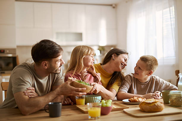 istock Young family enjoying breakfast 2224149247