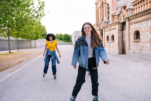 istock Young adults enjoying an afternoon skate together 2224150104