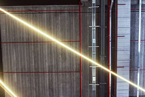 The sun seen through part of a dockside crane in Aarhus, a port city in Jutland, mainland Denmark.