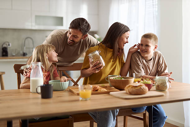 istock Young family enjoying breakfast 2224151262