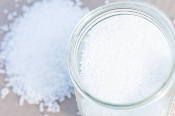 istock Urea granules (carbamide, CO(NH2)2) - nitrogenous mineral fertilizer. 2224151757
