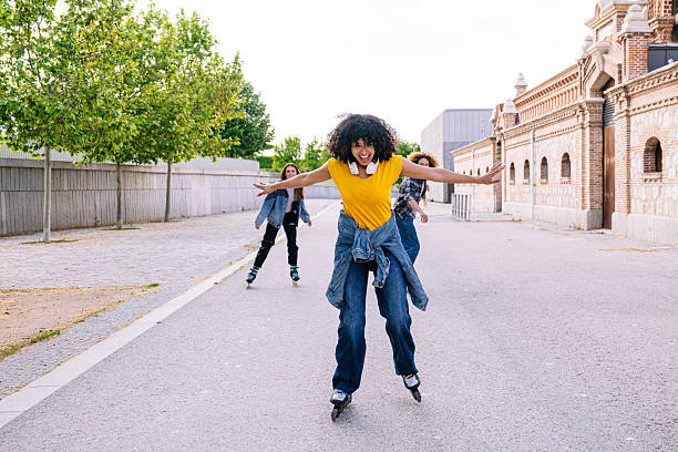 istock Friends enjoying an afternoon roller skating adventure 2224152715