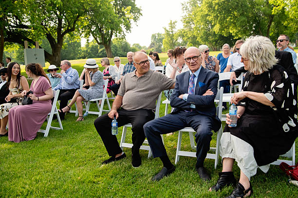 istock Wedding guests sitting, ready for the ceremony. 2224157081