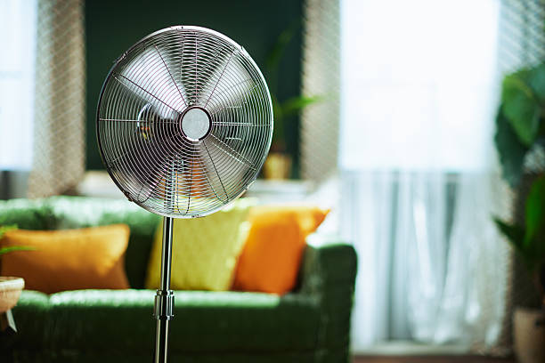 istock Silver Standing Fan for Summer Comfort 2224158035