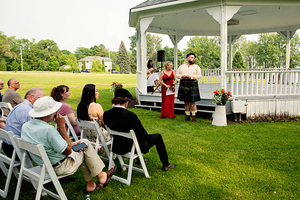 istock Millennial non-binary person waiting for the bride at wedding. 2224158225