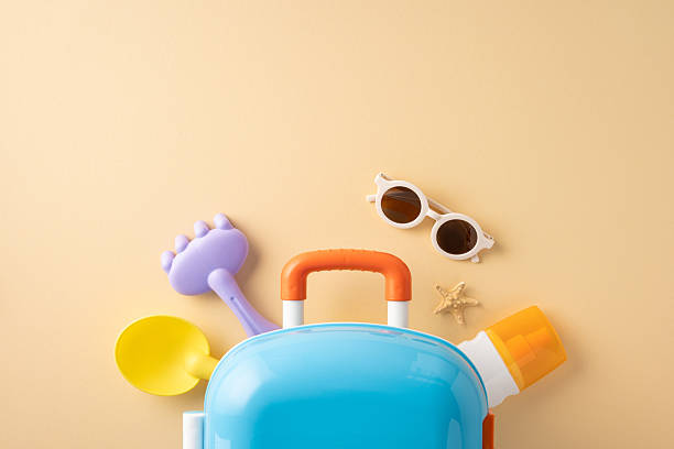 istock Travel and relaxation essentials for summer vacations, featuring kids' items and beach essentials 2224158451
