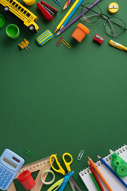 istock School vertical essentials like crayons, scissors, and calculator organized neatly for a creative display 2224158472