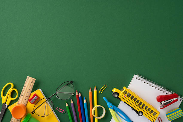 istock Various colorful school supplies including pencils, scissors, and a ruler placed on a table 2224158479