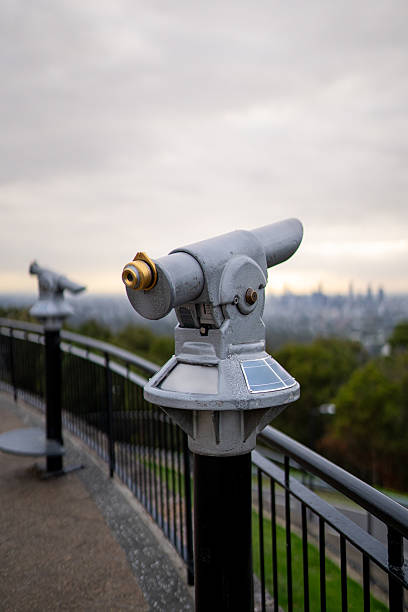 istock Coin-operated binocular overlooking brisbane in a cloudy day 2224159752