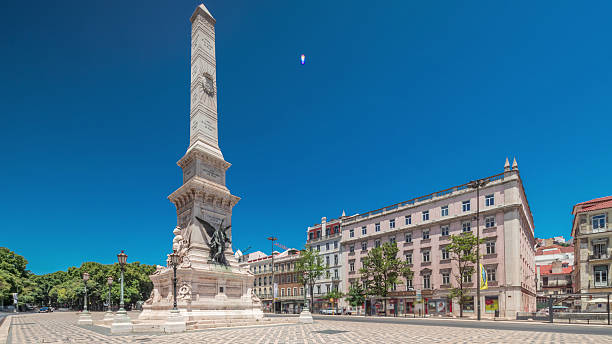 istock Restauradores Square in Lisbon timelapse hyperlapse. Monument to the Restorers and historical houses around 2224162765