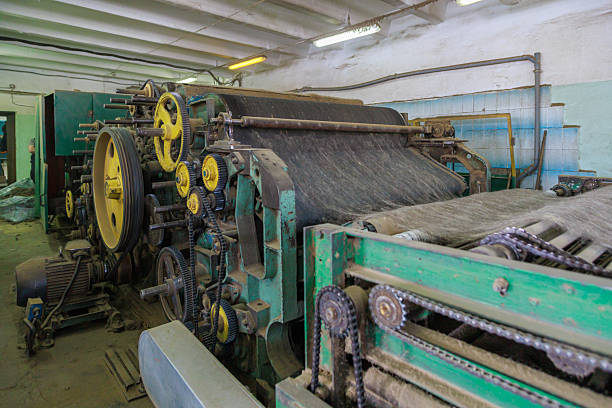 istock An old vintage machine in a workshop for the production of felt boots. 2224164449