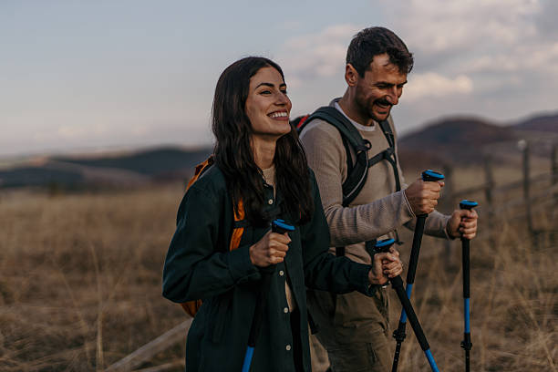 istock Young couple enjoying a hike in the mountains 2224175094