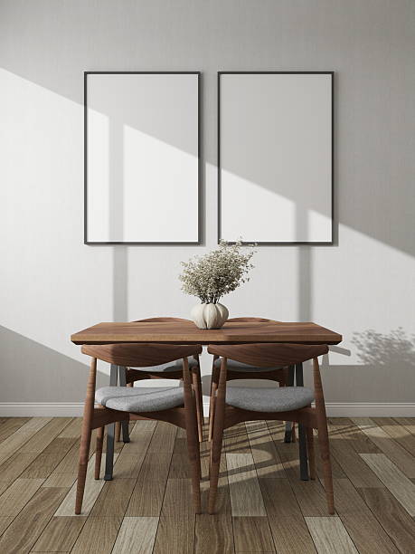 istock Modern dining room with two vertical frame mockups on a white wall next to a decorative sideboard and table 2224178336