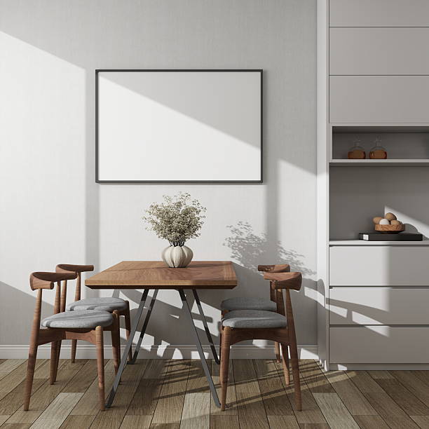 istock Modern dining room with a horizontal frame mockup on a white wall next to a decorative sideboard and table 2224178338