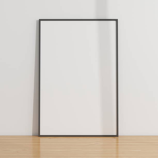 istock Vertical frame mockup on a wooden table and white wall 2224178377