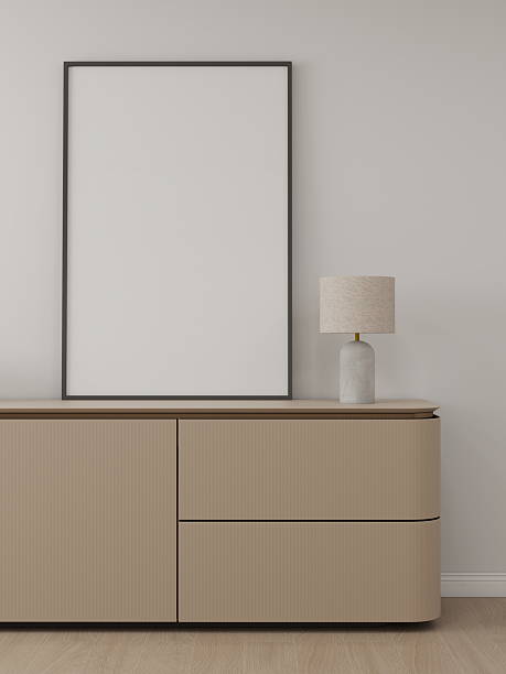istock Vertical frame mockup in a living room with a white wall and table lamp interior decoration 2224178405