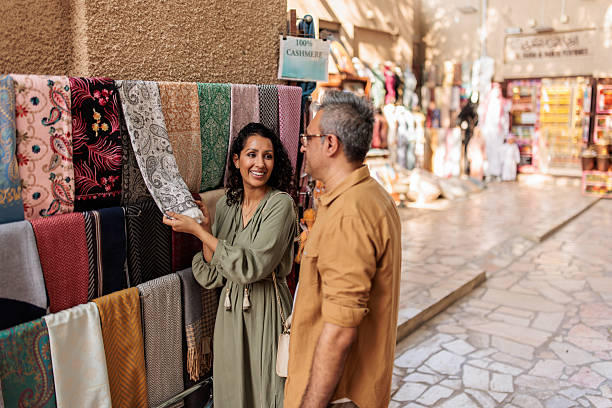 istock Arab Woman Choosing Headscarf with Husband’s Help 2224179290