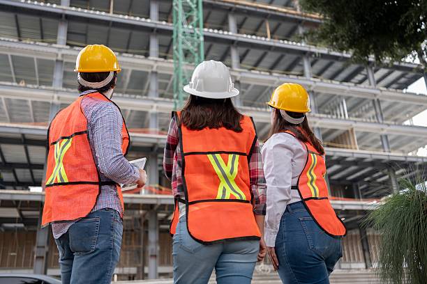 istock coworkers talking at the construction site 2224183152