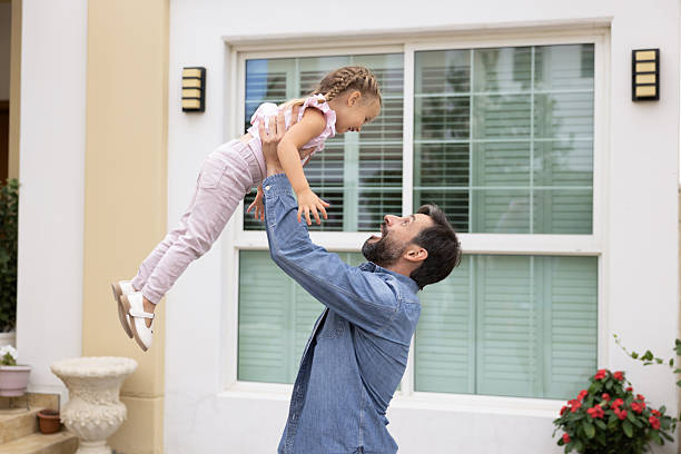 istock Cheerful playful dad playing with cute daughter child 2224193020