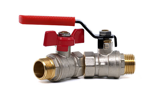 istock A brass ball valve with a bright red handle, perfect for plumbing projects. 2224194491