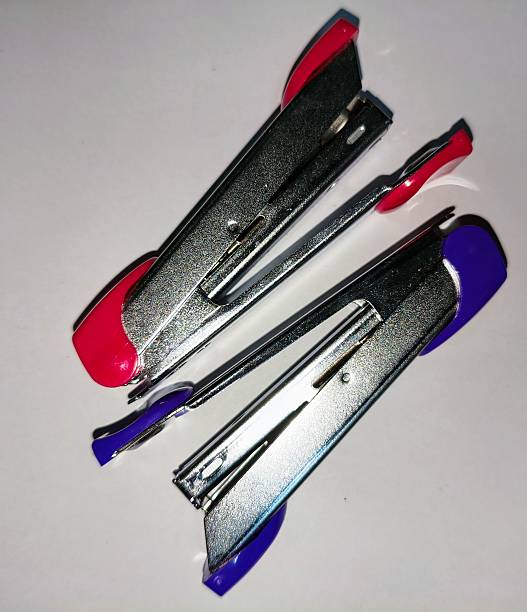 istock Two Staplers Red and Blue Office Supplies 2224197917